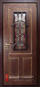 Двери с ковкой - фото